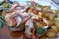  Rabbit Wrapped in Fresh Sage and Red Peppers with Sauteed Potatoes and Seasonal Vegetables