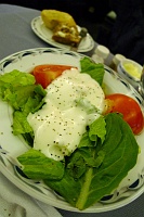  Hearts of romaine and mesclun salad mix with vine-ripened tomatoes and Mandarin orange segments topped with buttermilk ranch dressing