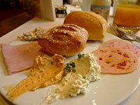  Bread and apfeltasche with assorted cold cuts, spreads, and vanilla custard