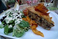  Rabbit pie of potatoes, mushrooms, and shallots served with a green salad and homemade fruit ketchup