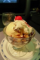  Blue Bell Homemade Vanilla ice cream with hot fudge, whipped cream, nuts, and cherry on top