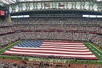  Field-sized American flag during National Anthem