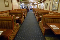  Real life: Solvang Restaurant is famous for its aebleskivers.  The booth in which Miles and Jack sat in the film is the fourth on the right, light glistening from the bird mural on the wall.  The blue dishes on behind Jack's left shoulder and the small graduated frames behind Miles' right shoulder in the movie appear to have been replaced with larger framed pictures and paintings.