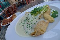  Ham and Cheese Crepe with Bechamele, Chives, Egg, Micro Greens, Mustard, and Breakfast Potatoes at Mon Ami Gabi