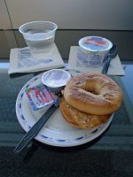  Toasted Raisin Bagel with Cream Cheese and Raspberry Yogurt at the United Club in Las Vegas