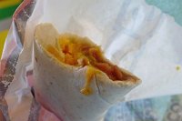  Bean burrito with green sauce at Del Taco