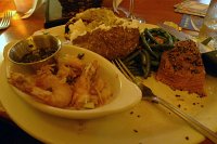  6 oz Joe's Steak with 3 jumbo Railroad Shrimp, loaded baked potato, and Blue Lake Green Beans at Tahoe Joe's