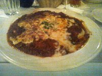  Baked cheese ravioli with meat sauce and mozzarella cheese at Uricchio's