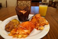  Breakfast at Homewood Suites: Scrambled egg enchiladas, refried beans, and freshly baked cranberry muffin with orange juice