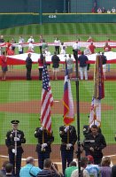  Clay Walker (lower right) performs National Anthem