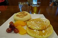  Breakfast at Hyatt Place Albuquerque Airport: Ham/cheese/egg english muffin, pancakes, and fresh fruit with apple juice and ice water