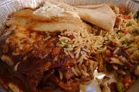  Take-out from Tune-Up Cafe - Santa Fe, NM: Chicken Mole Colorado Enchiladas with Spanish rice and grilled banana