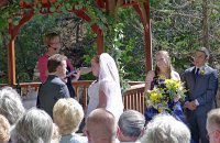  Vows; maid of honor looks on