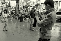  Tourists pose in Times Square