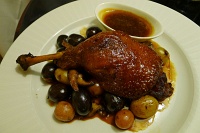  Crispy Perigord duck leg confit, sautéed fingerling potatoes and organic mushrooms