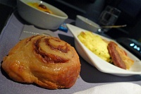  First Class breakfast service: cinnamon roll