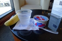  Breakfast at United Club LAX: banana, raspberry yogurt, and water