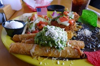  Rolled tacos with guacamole and queso fresco at Fred's Mexican Cafe in Huntington Beach