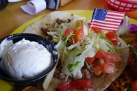  Cheeseburger taco with sour cream at Fred's Mexican Cafe in Huntington Beach