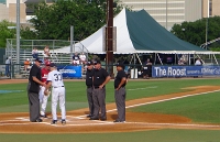  Coaches Dave Van Horn and Wayne Graham shake hands