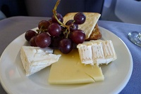  International cheese selection with grapes and crackers