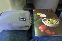  United BusinessFirst amenity kit and menu