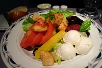  Fresh seasonal greens with tomatoes, kalamata olives, bell peppers, baby mozzarella, and croutins with balsamic vinaigrette