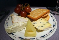  International cheese selection with grapes and crackers