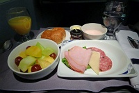  Chilled Deli Selection of Brie and Swiss cheeses, Black Forest ham, Genoa salami and turkey.  Served with fresh fruit, yogurt, croissants with butter and jam, orange juice, and water