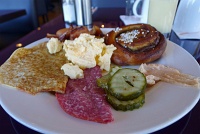  Sheraton Breakfast Buffet: Swedish pancakes, scrambled eggs, Swedish sausage, bacon, salami, Swedish sweet pickles, Kalles caviar, cinammon roll, and mango smoothie