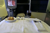  White table cloth setting, in-flight movie 