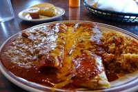  Perea's combination plate (one taco, one enchilada, and one tamale) with red chili at Perea's New Mexican Restaurant