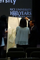  Representatives of Nanjing University present Rice first lady Ping Sun with a commemorative scroll