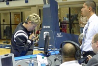  Referee tests instant replay system.