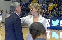  Rice coach Greg Williams and Baylor Coach Kim Mulkey meet at half court.
