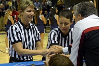  Famous women's head coach Van Chancellor greets officiating crew