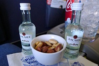  Warm nuts with Rum and Coke, First Class