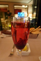  The Dream (Perrier-Jouet Grand Brut Champagne, St-German Elderflower Liqueur, preserved hibiscus) at Encore