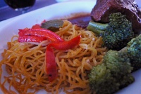  First Class dinner: Asian short ribs with noodles and broccoli