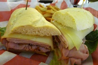  California Club at TGI Friday's Room Service: Mesquite-smoked turkey breast, applewood-smoked bacon, ham and Monterey Jack cheese on a fresh-baked baguette with romaine lettuce, tomatoes, avocado and mayo