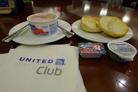  Raspberry non-fat yogurt and toasted bagel with butter and jelly, Terminal C United Club - IAH