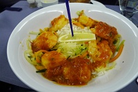  Indian-spiced Shrimp with spicy tomato sauce, basmati rice and julienned vegetables - BusinessFirst Class, United Airlines