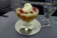  Vanilla ice cream sundae with caramel, strawberries and whipped cream - BusinessFirst Class, United Airlines