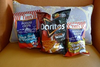  Tim's Sea Salt & Vinegar Potato Chips, Doritos Locos Tacos Chips, and Tim's Cheddar & Sour Cream Potato Chips
