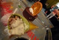  Chinese Five Spice Roasted Pork, Mango Creme Fraiche in a Green Tea-infused Waffle Cone; Gran Marnier Pot de Creme with Candied Clementine from Kirby's