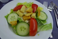  Fresh seasonal greens with tomatoes, cucumbers and croutons with classic Caesar dressing - IAH-FRA