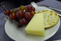  International cheese selection with grapes and crackers - IAH-FRA