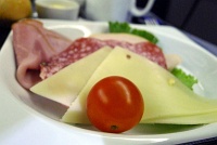  Chilled deli selection of swiss cheese, Black Forest ham, Genoa salami and turkey - IAH-FRA
