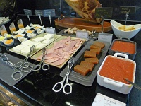  Hotel Gran Melia Colon breakfast buffet, Sevilla: Meats, fresh cheeses, quince, and tomato sauces