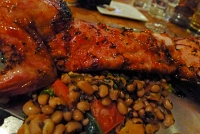  Local farm raised rabbit roasted in a sweet Thai chili glaze with a medley of black eyed peas, heirloon tomatoes and organic spinach